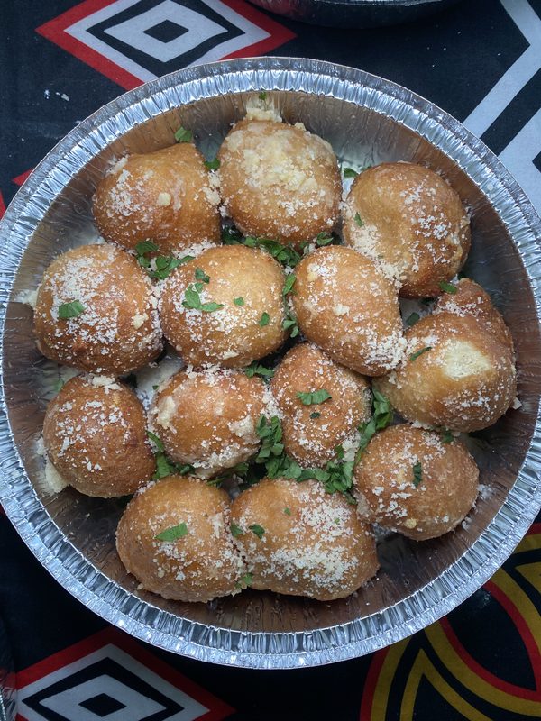 Garlic parmesan beignets tossed in garlic and parmesan